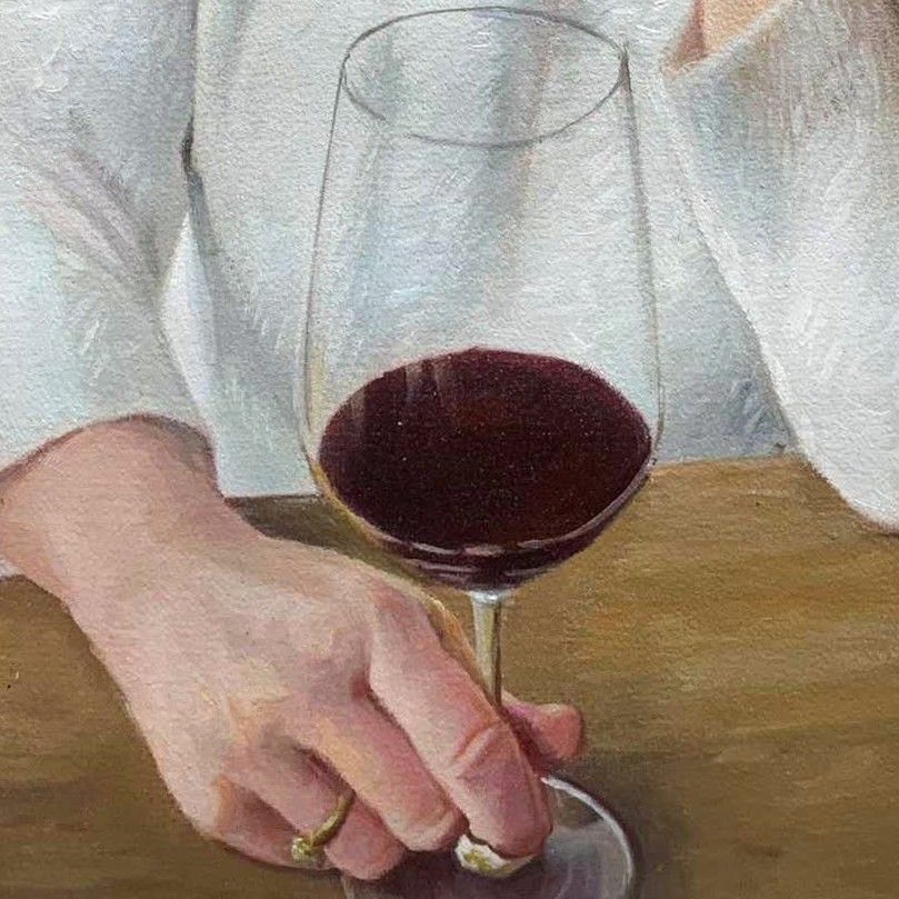 Close-up crop of a hand-painted portrait, showing how the face is handled at small scale