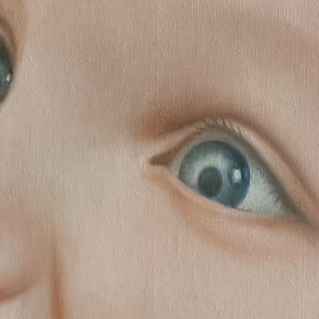 Close-up of the hand-painted portrait: the eyes