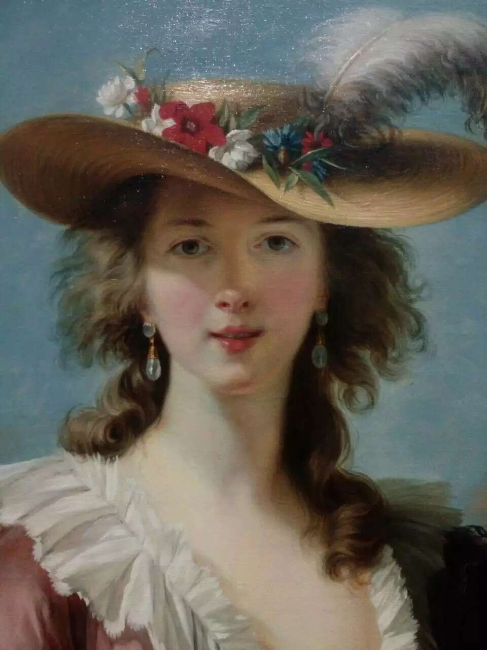 A copy after Vigée Le Brun showing a woman in a flower-trimmed straw hat.
