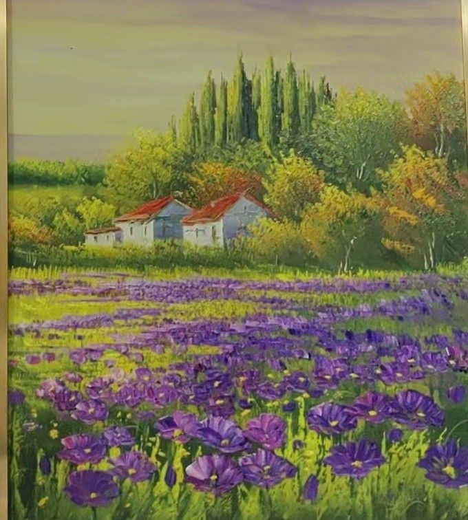 A country house sits beyond a broad lavender field under a warm evening sky.