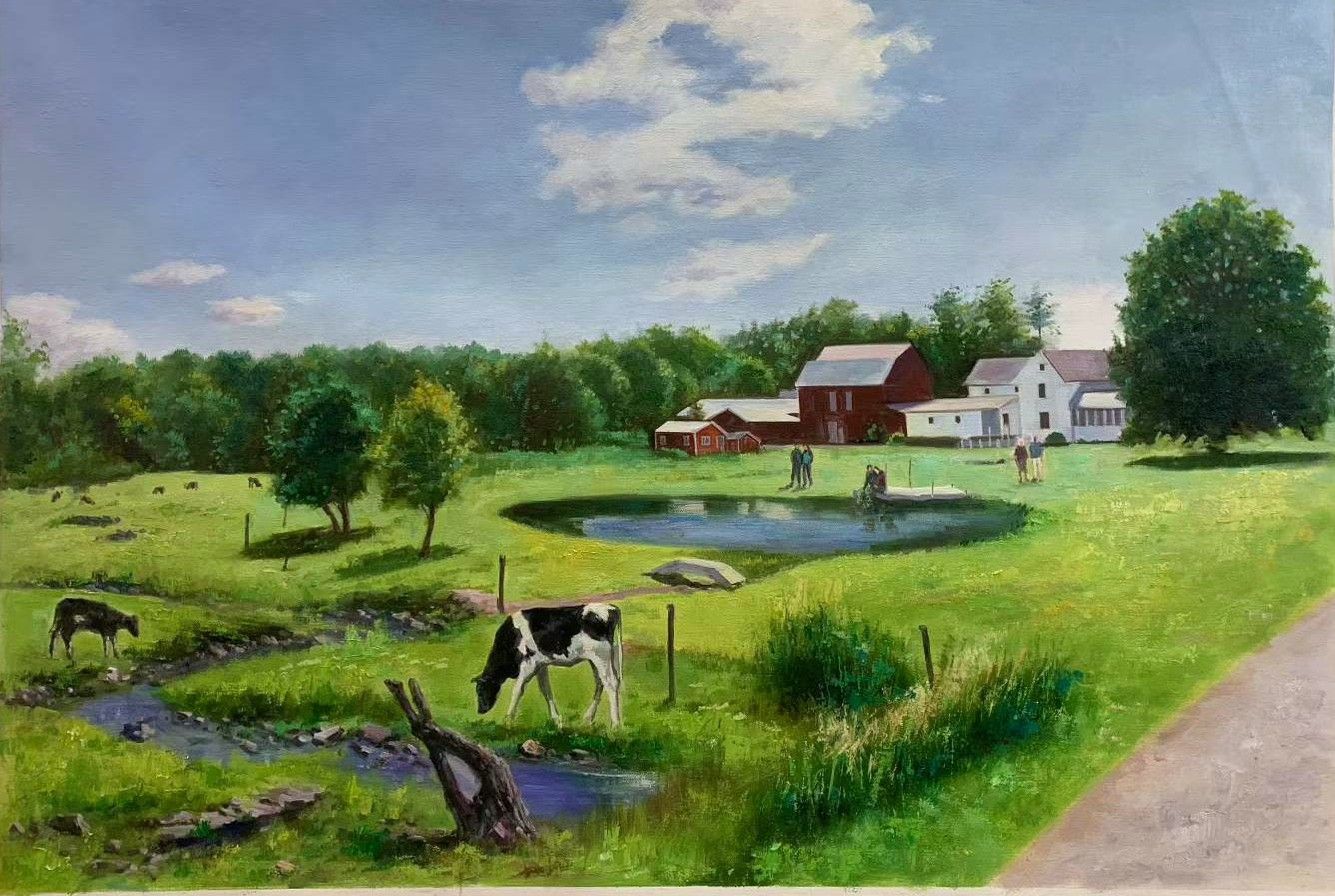 Cows grazing near a pond and farm buildings in a green landscape.