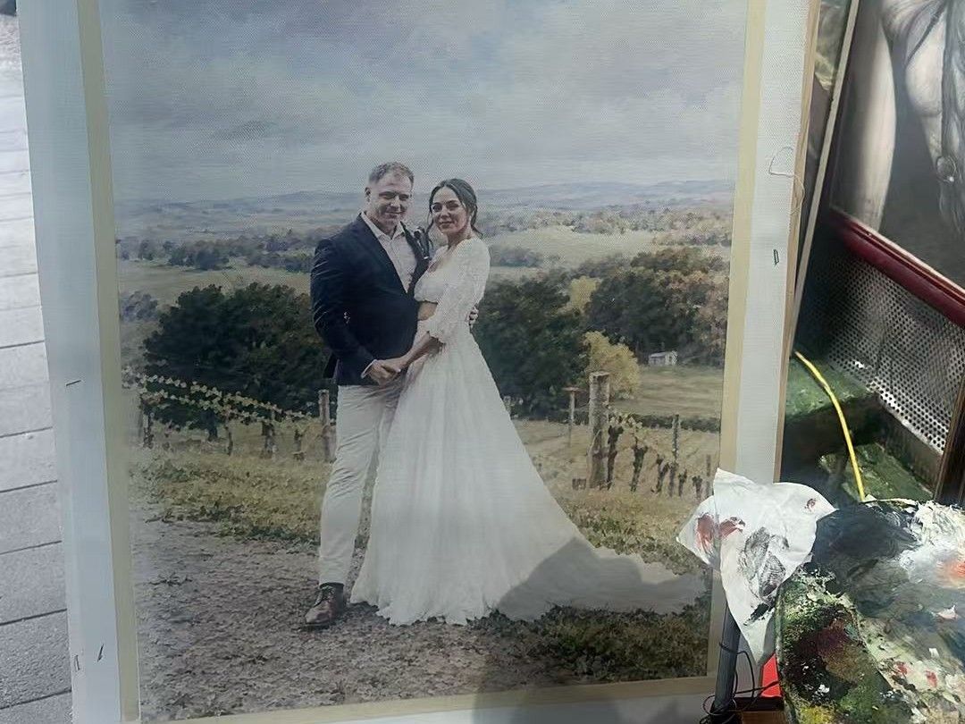 The wedding painting photographed on its easel in the studio.: the portrait in progress